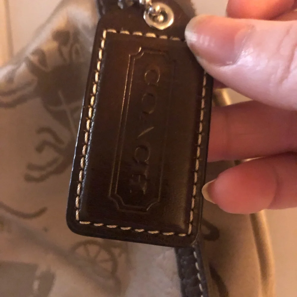 € Coach “Ashley” Sateen Stagecoach Purse- $200 or $180 w/offer